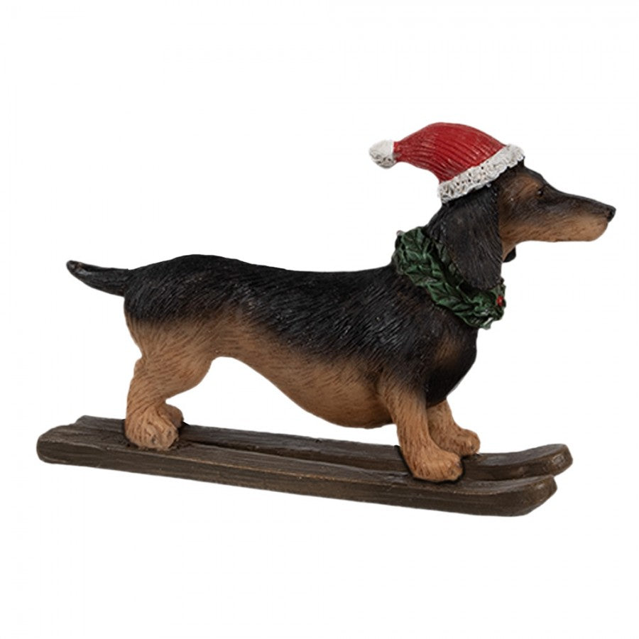 Weihnachtsfigur Hund Dackel auf Skiern mit Nikolausmütze Polyresin Schwarz Braun Rot 10x3x7 cm von Clayre & Eef (6PR4173)