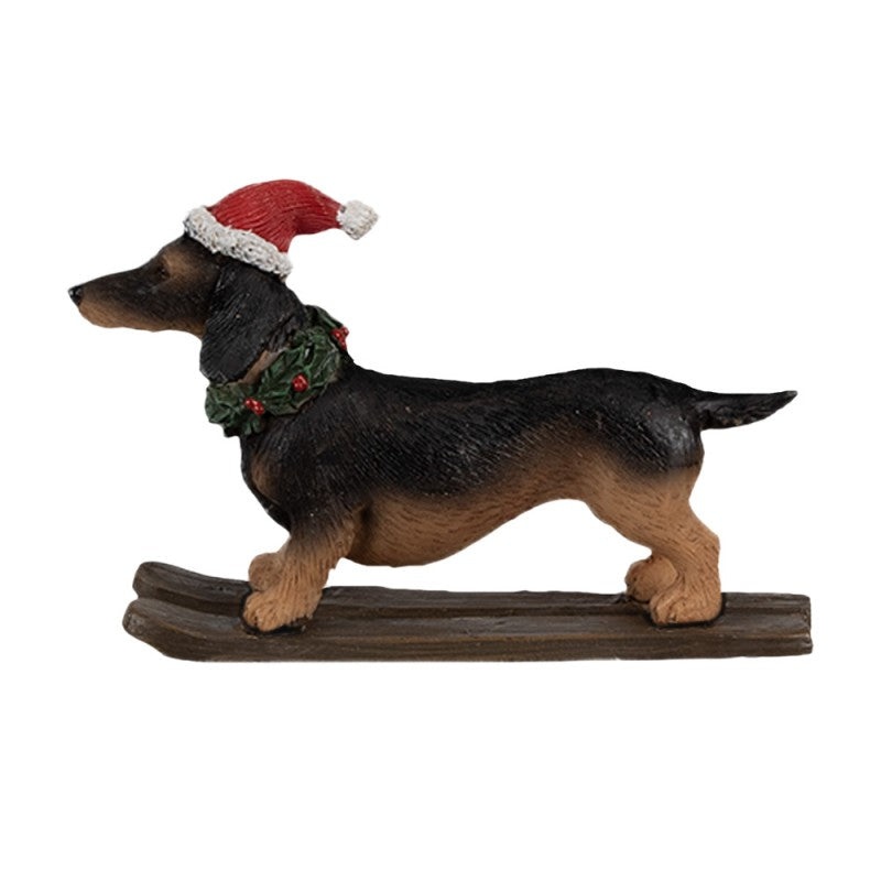 Weihnachtsfigur Hund Dackel auf Skiern mit Nikolausmütze Polyresin Schwarz Braun Rot 10x3x7 cm von Clayre & Eef (6PR4173)