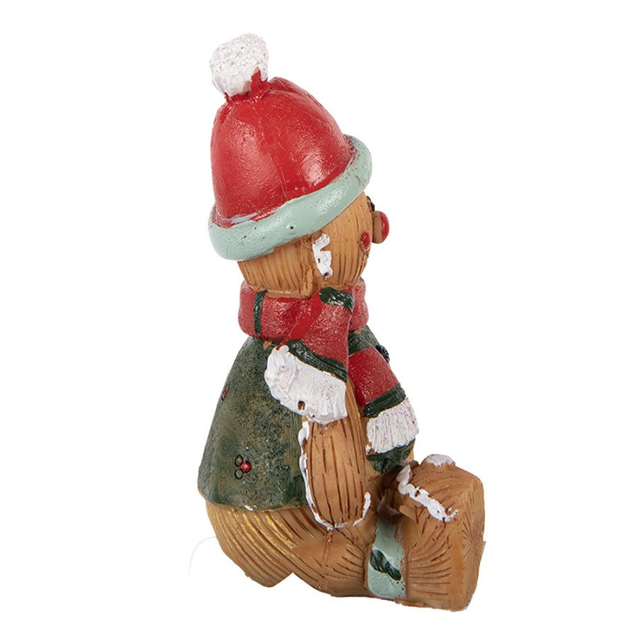 Weihnachtsfigur Pfefferkuchenmann sitzend mit Geschenk Polyresin Bunt 7x5x9 cm von Clayre & Eef (6PR6340)
